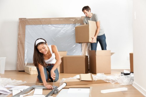House movers loading furniture in a Sutton residential street