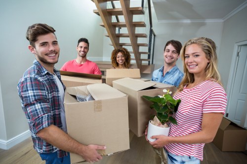 Removal van and packed boxes for a local move in Sutton