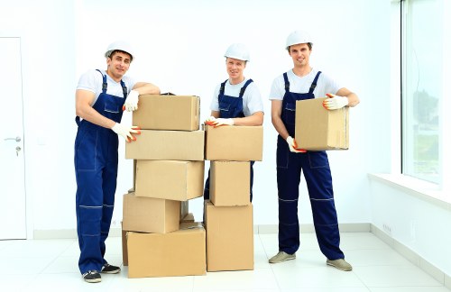Removal team loading household items for a Sutton moving service