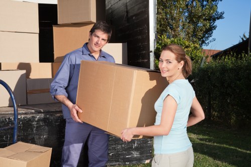 Packed boxes and furniture prepared for Sutton truck hire
